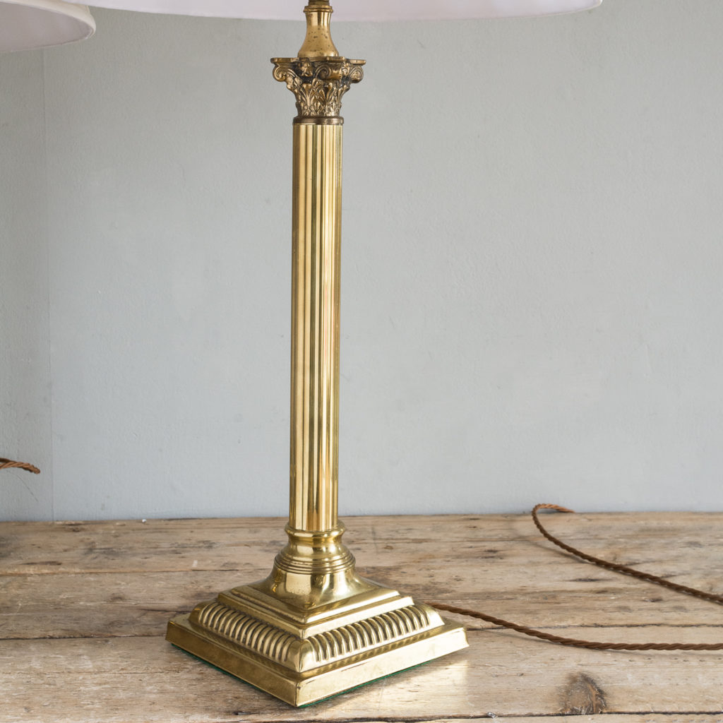 Pair of brass Corinthian column table lamps,