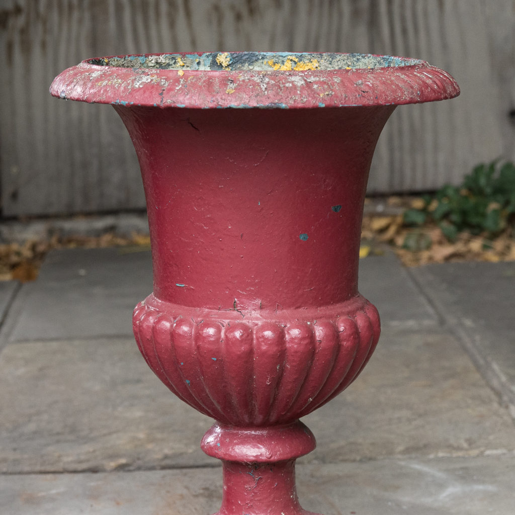 Pair of cast iron campana urns,