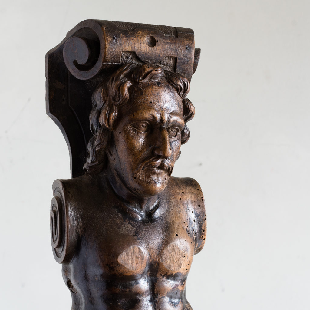 Pair of eighteenth century walnut figural terms,