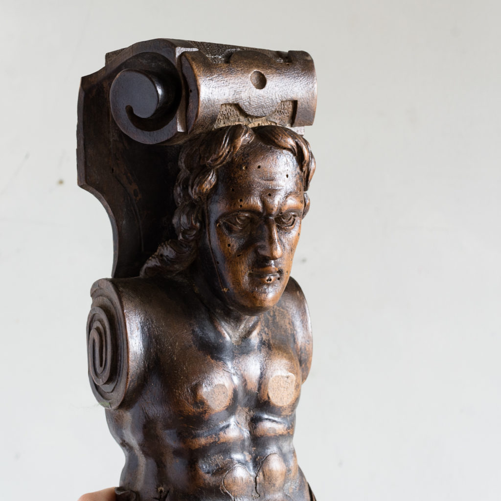 Pair of eighteenth century walnut figural terms,