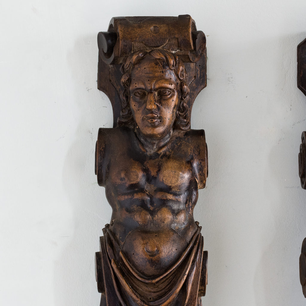 Pair of eighteenth century walnut figural terms,