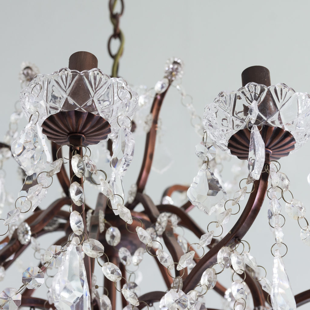 Twelve light glass lustre and bronzed metal chandeliers, -131587