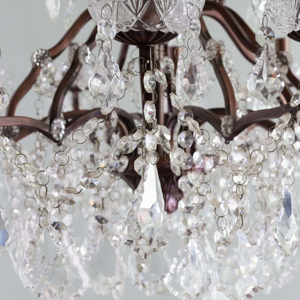 Twelve light glass lustre and bronzed metal chandeliers, -131589