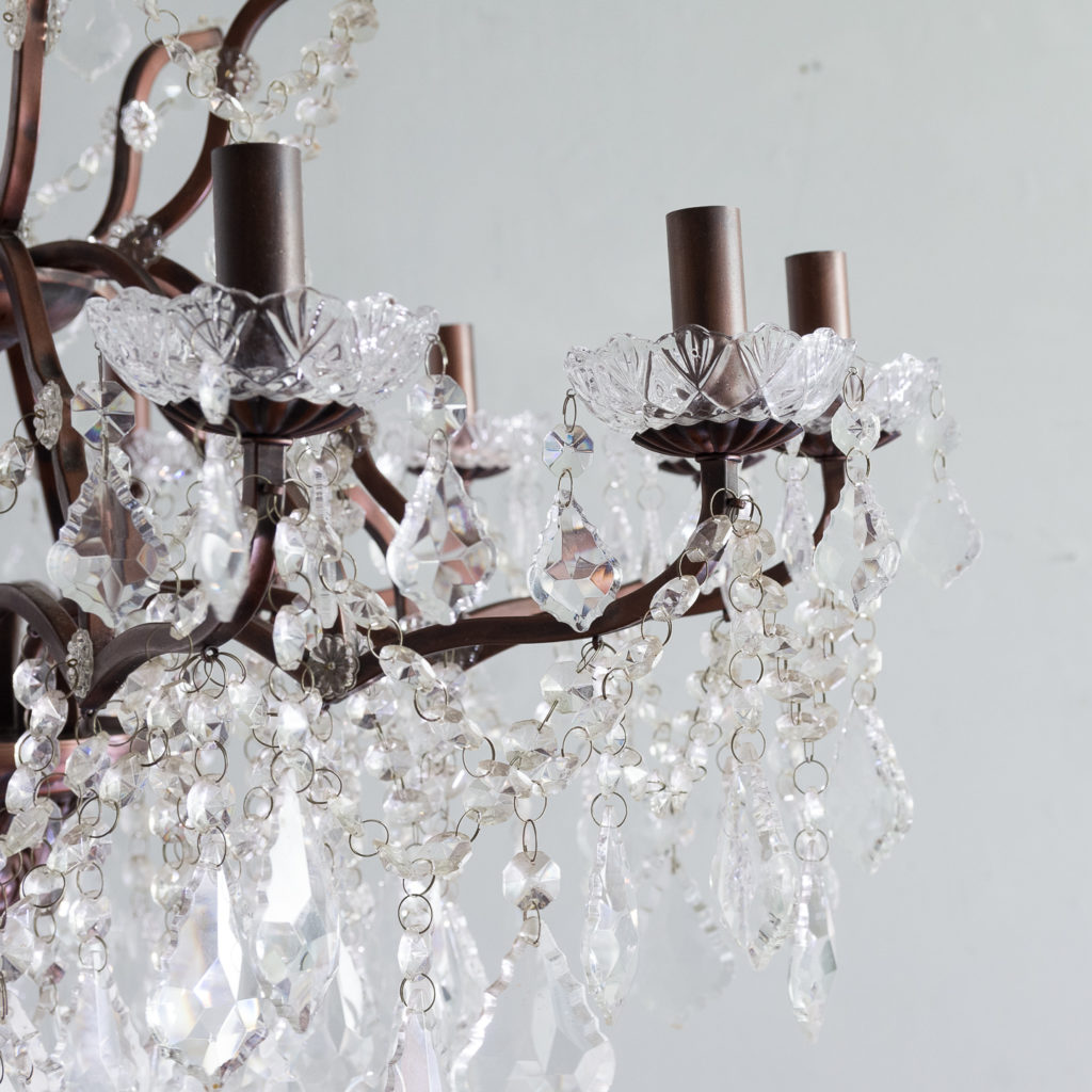 Twelve light glass lustre and bronzed metal chandeliers, -131588