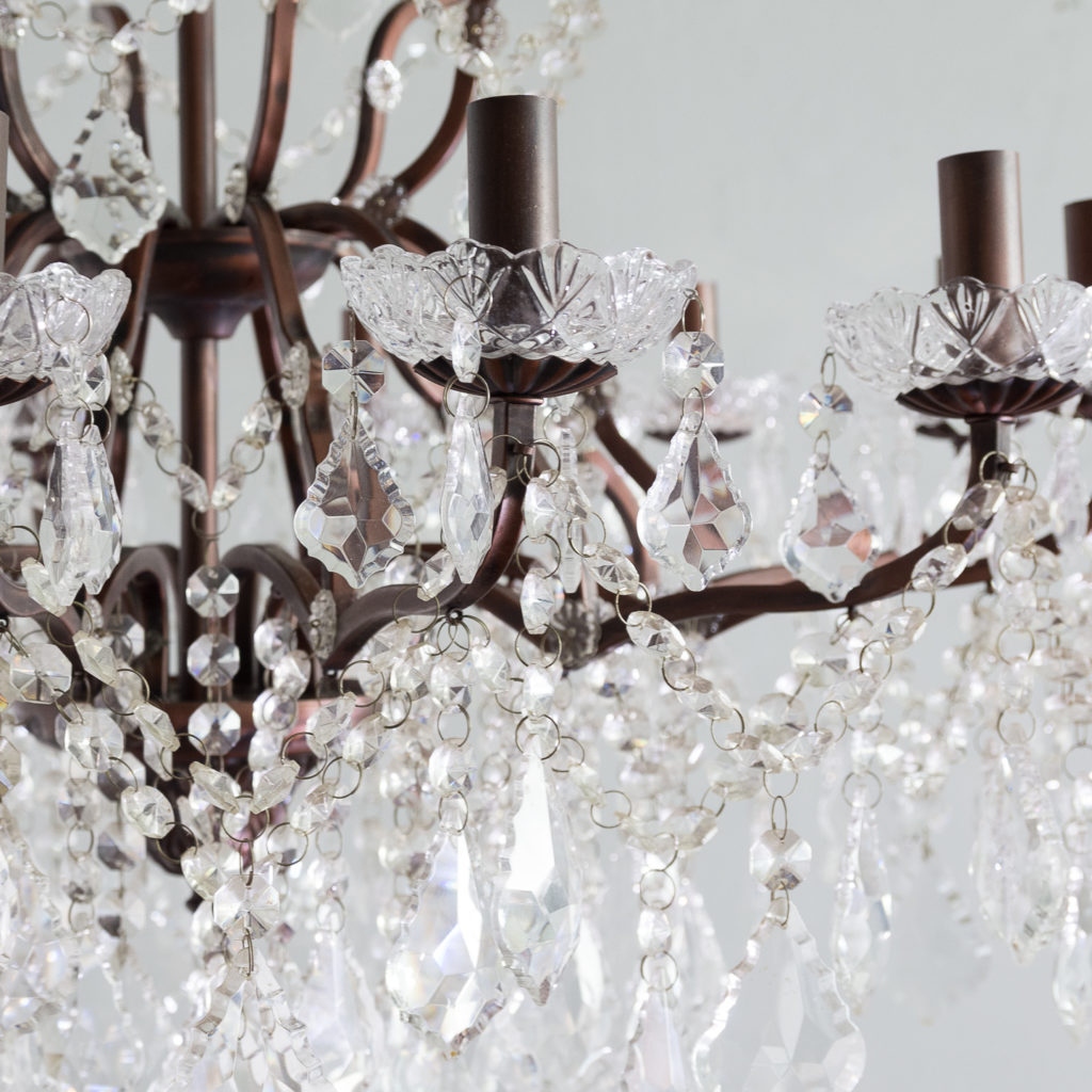 Twelve light glass lustre and bronzed metal chandeliers, -131590