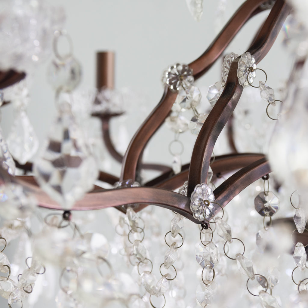 Twelve light glass lustre and bronzed metal chandeliers, -131591
