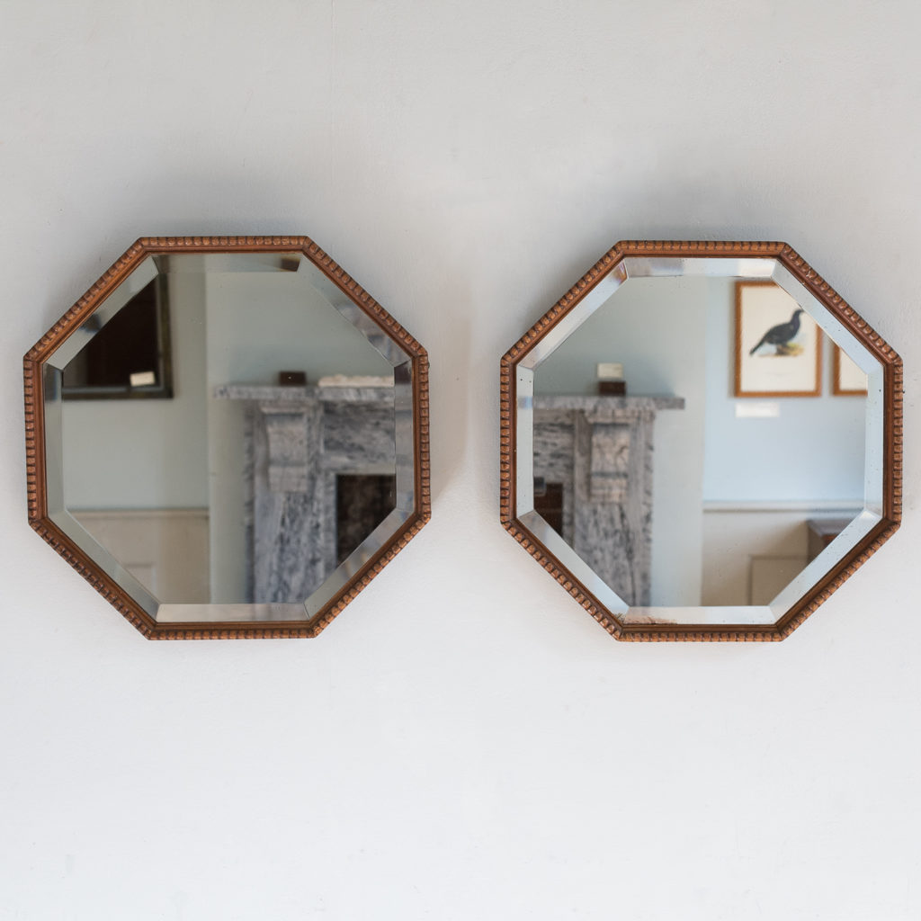 Pair of 1920s octagonal mirrors,