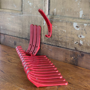 Red plastic school coat hooks