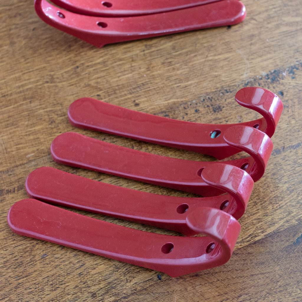 Red plastic school coat hooks