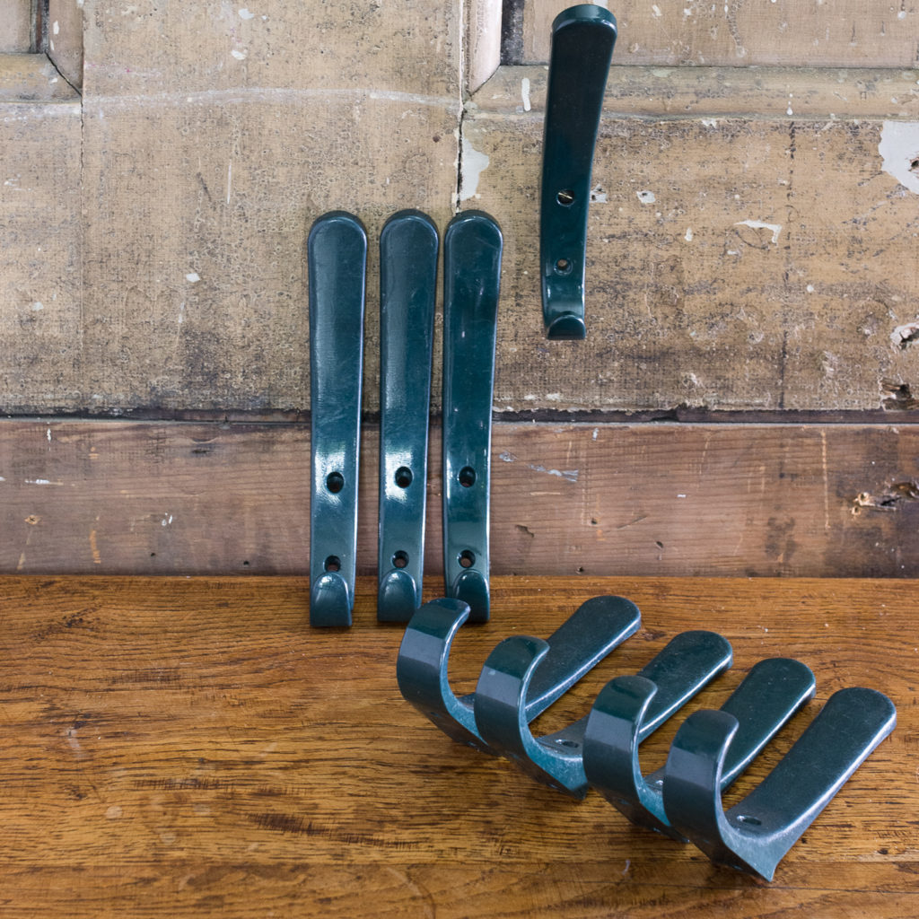 Green plastic school coat hooks