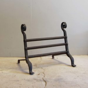 A wrought iron bar grate-0