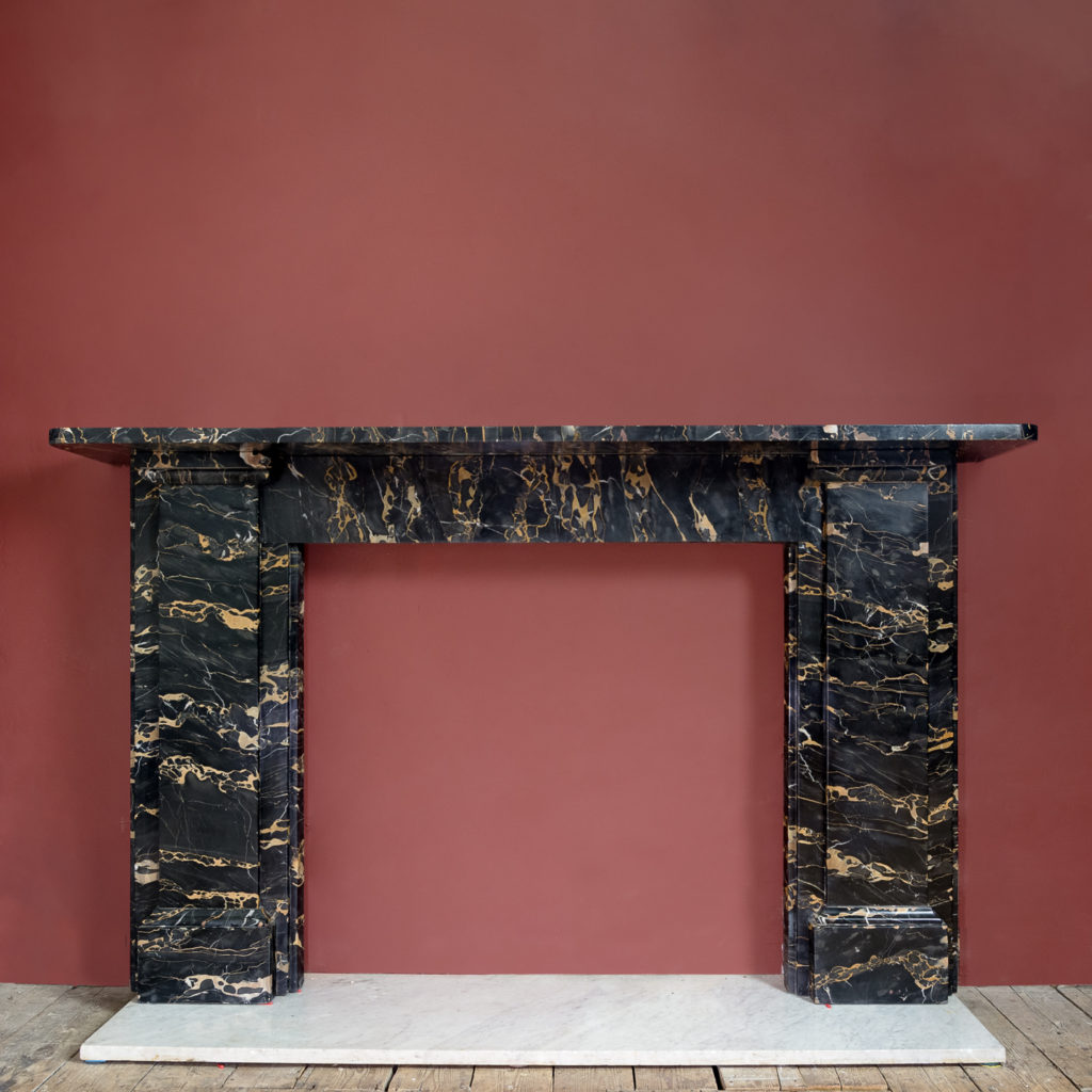 Antique Portoro marble fireplace mantel
