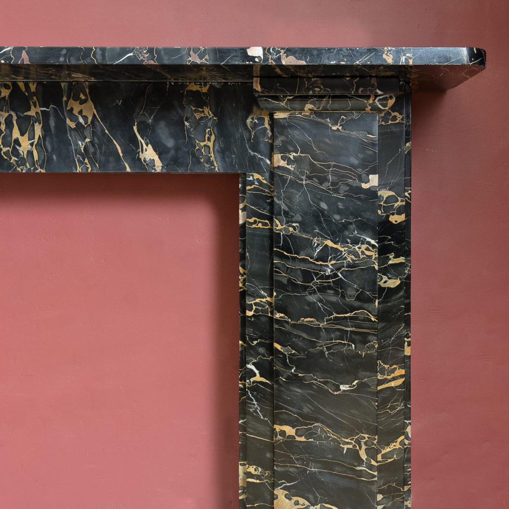 Nineteenth century Portoro marble chimneypiece,