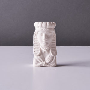 A plaster cast of an Egyptian head,-0