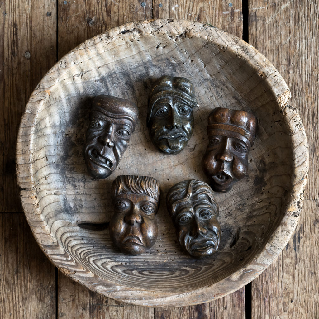 Early twentieth century carved oak grotesque mask,