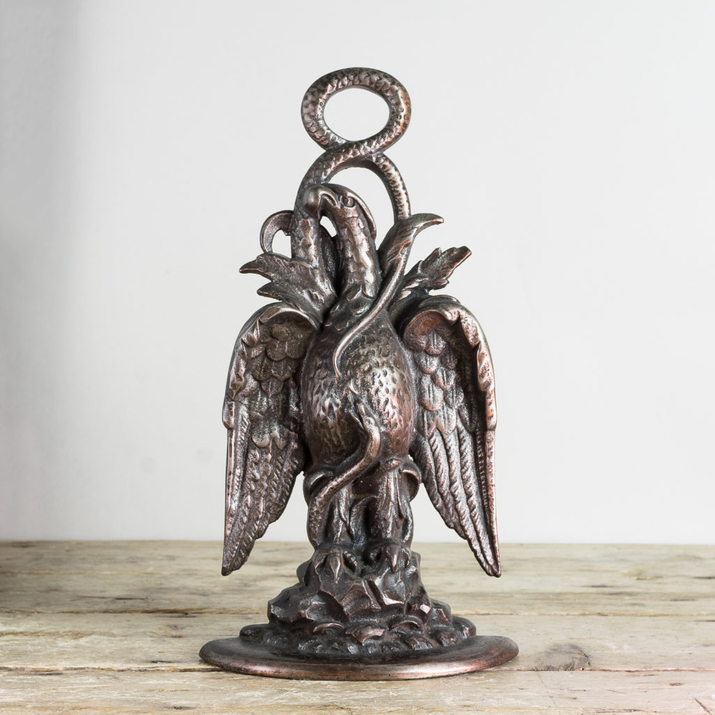 Late nineteenth century cast iron door stop,