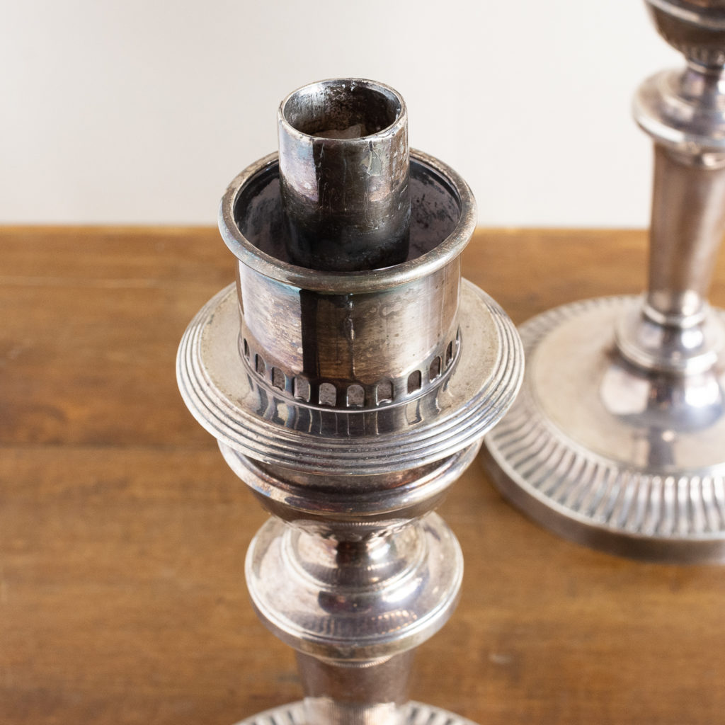 Pair of nineteenth century Sheffield plate candlesticks,-134889