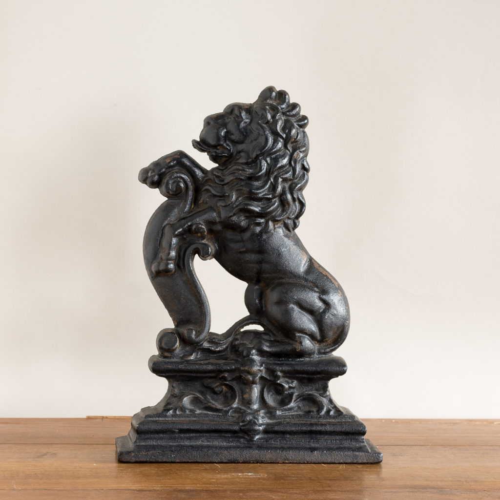 Pair of late Victorian rampant lion cast iron door stops,-134872