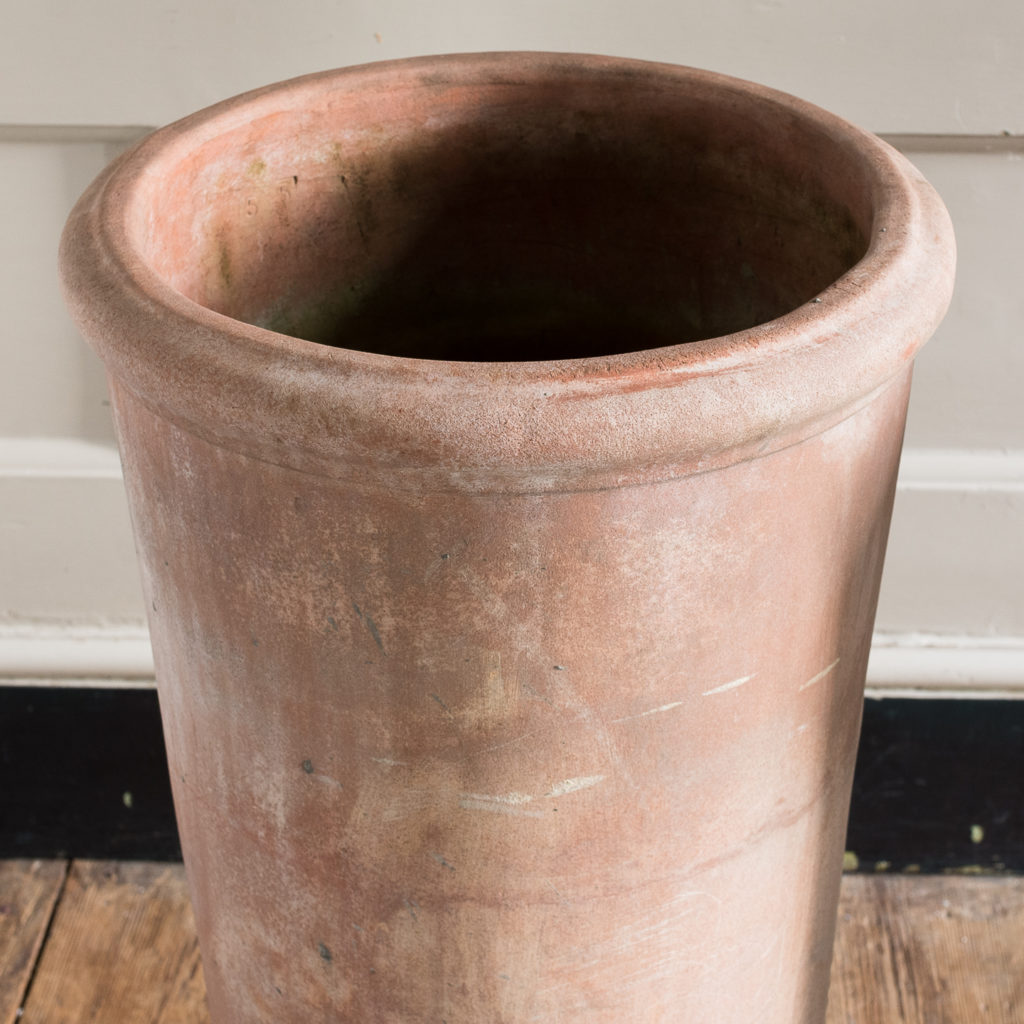 Two tapered cylindrical terracotta planters,-136087