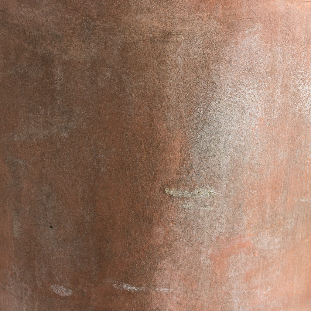 Two tapered cylindrical terracotta planters,-136090