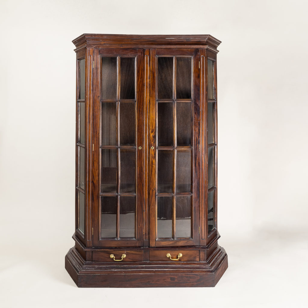 Twentieth century Indian hardwood and glazed display cabinet,