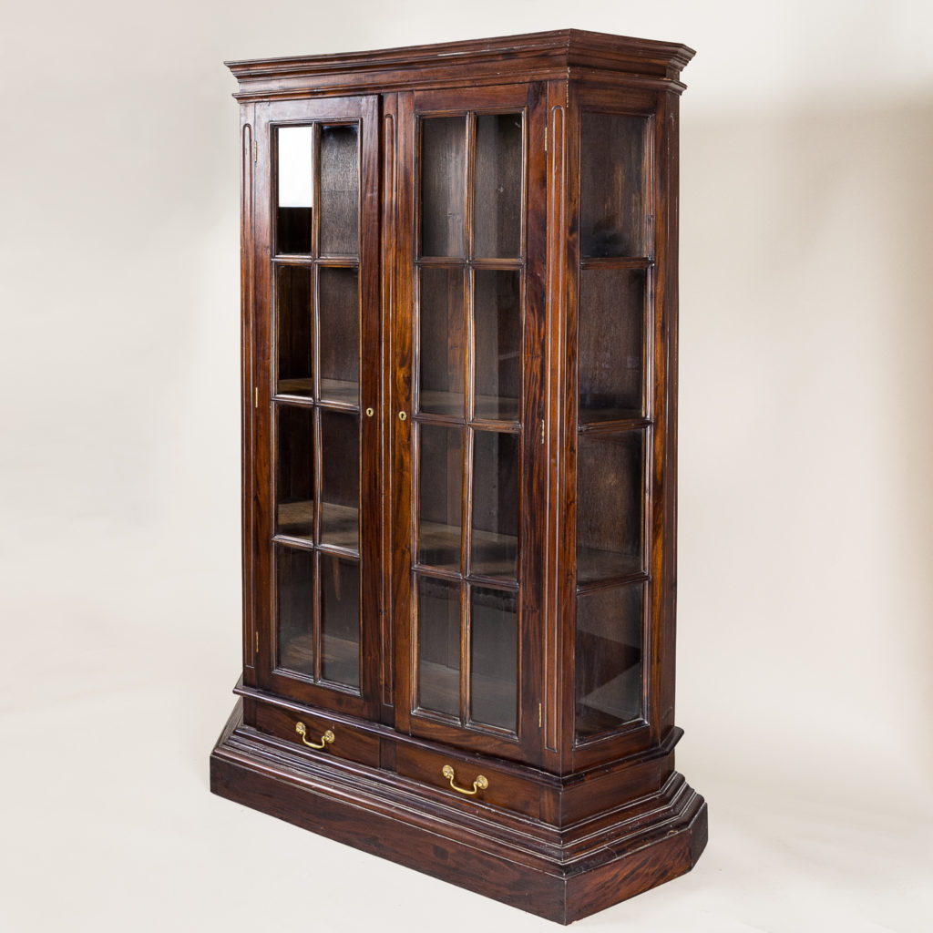 Twentieth century Indian hardwood and glazed display cabinet,