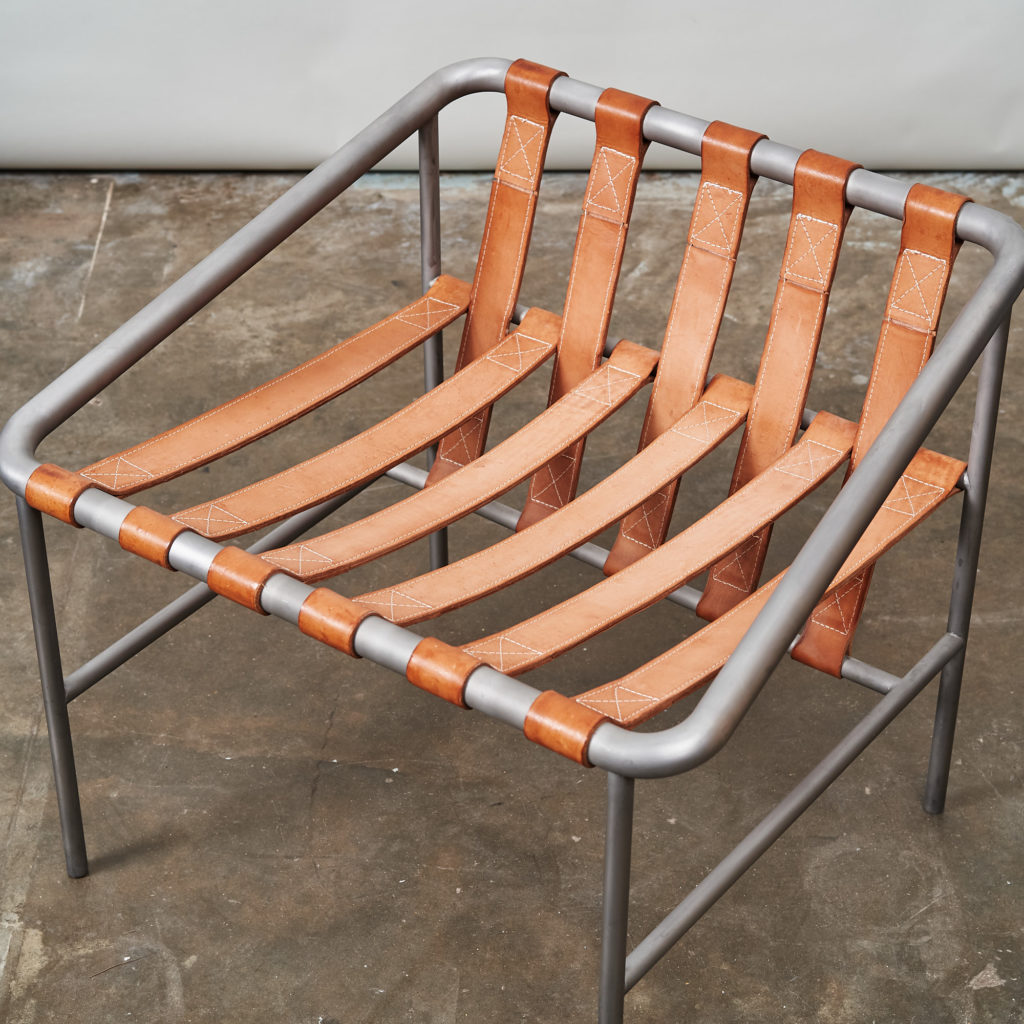 Steel framed lounge chair with leather straps,-136673