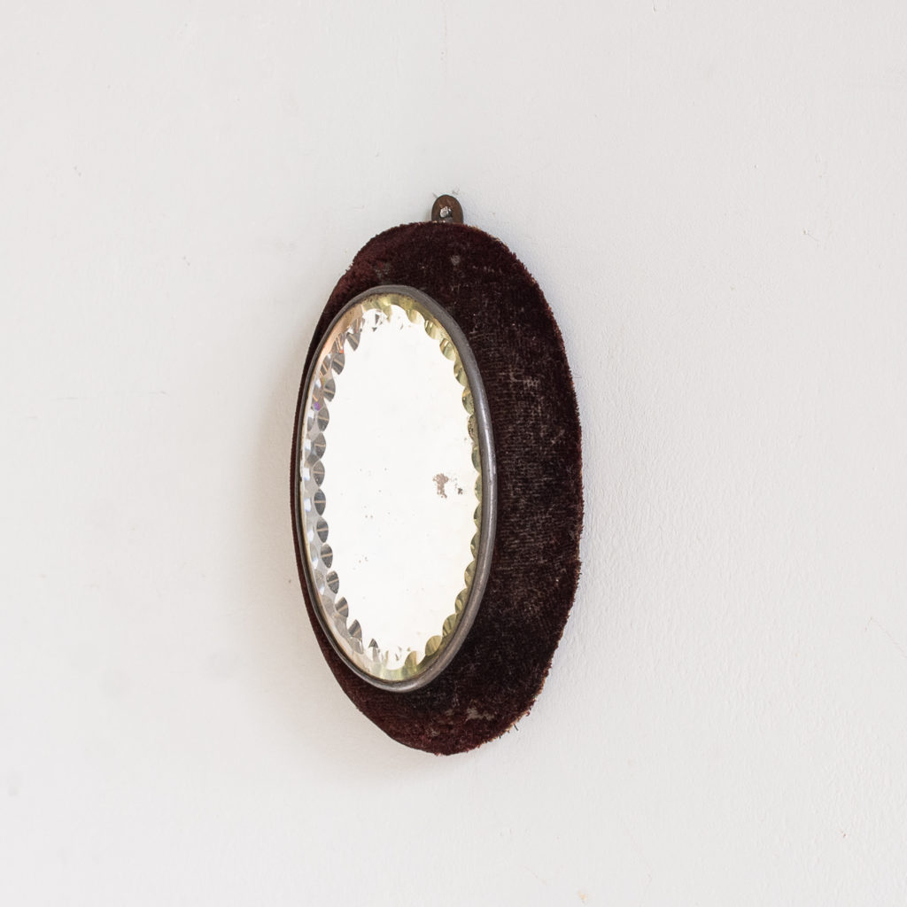 Small Edwardian cut glass oval mirror,