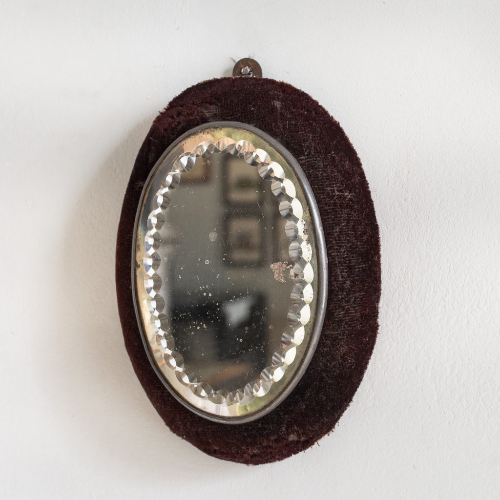 Small Edwardian cut glass oval mirror,