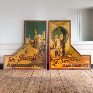 Pair of English mid-twentieth century painted fairground panels,
