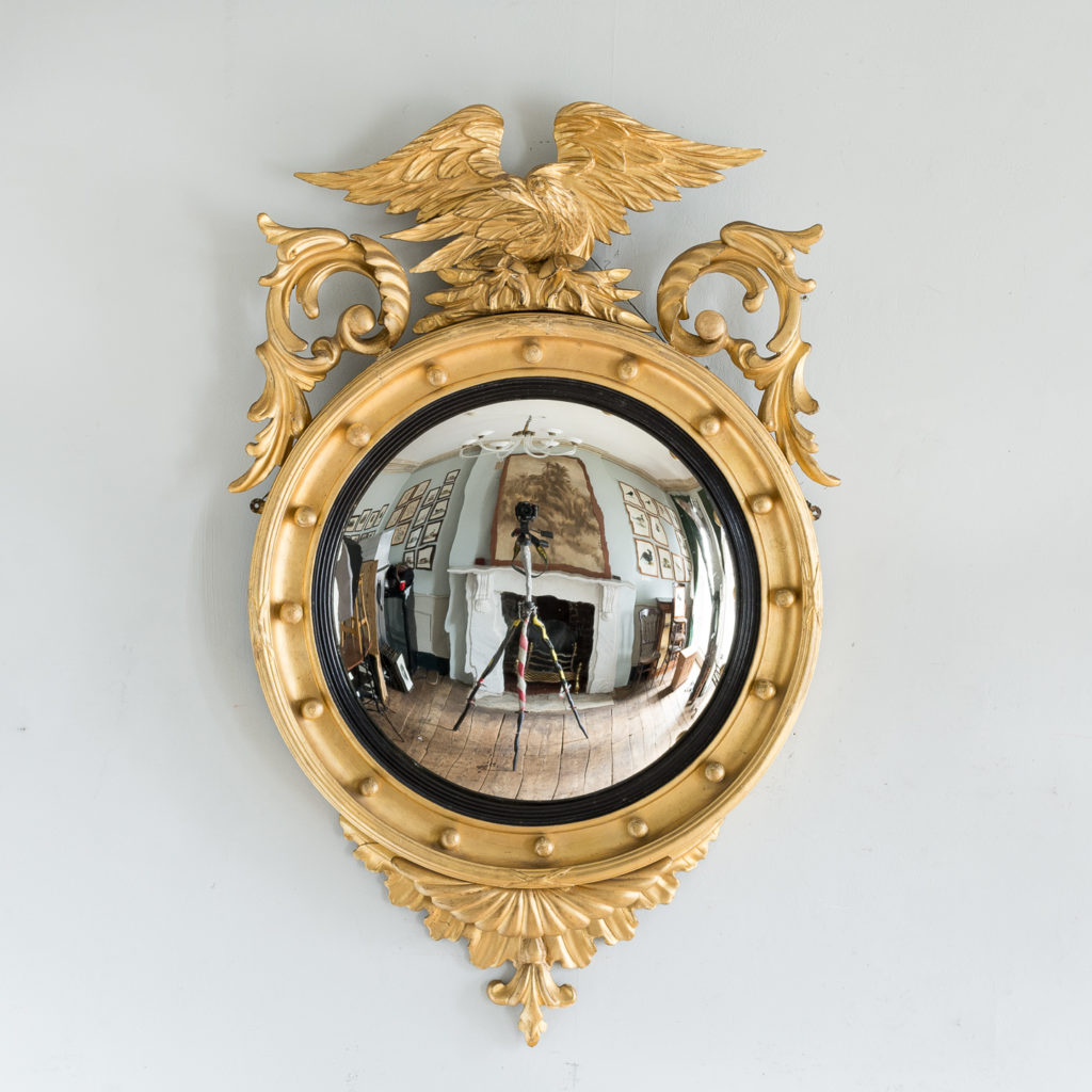 Regency style giltwood convex mirror,