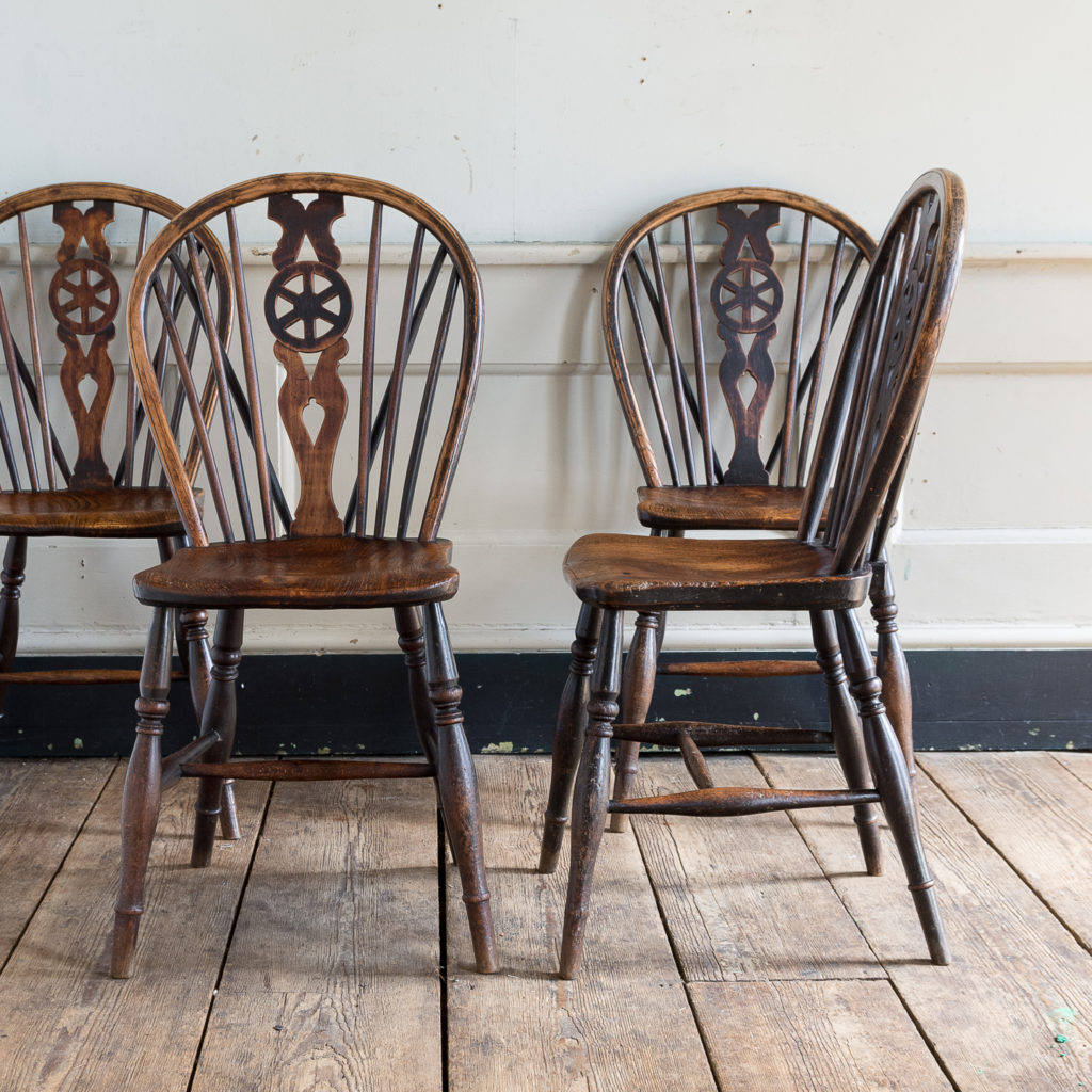 Set of four nineteenth century wheelback Windsor chairs,