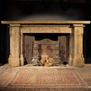 A notable Victorian sandstone chimneypiece, with rouge royale marble details,-0