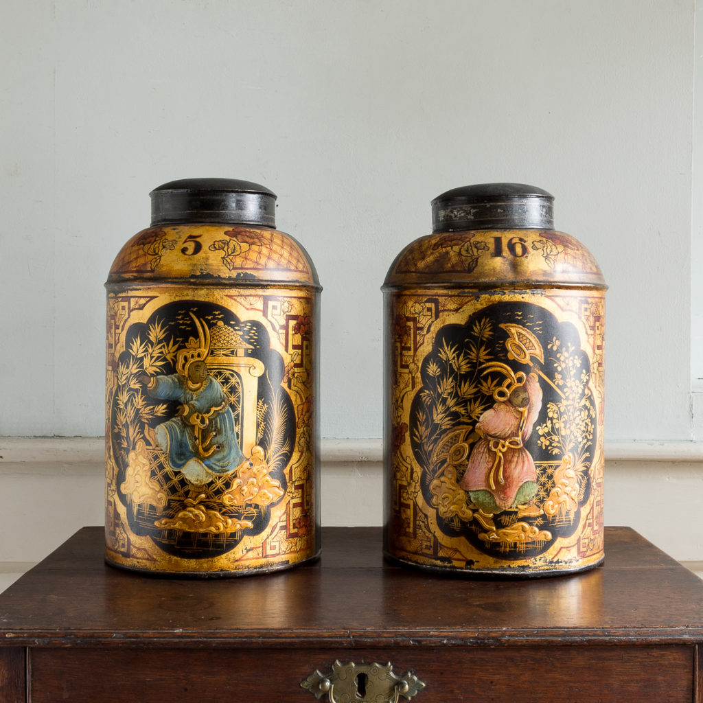 Pair of nineteenth century parcel-gilt tea canisters,