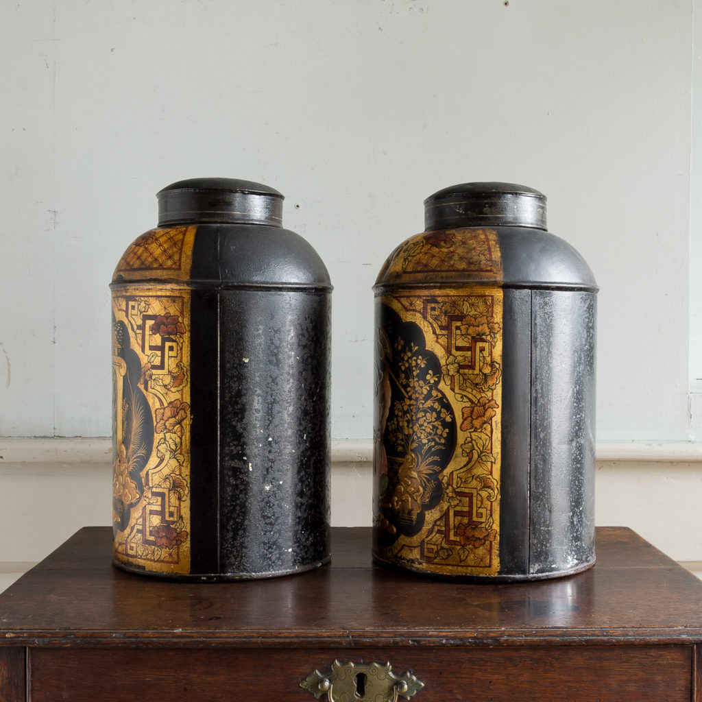 Pair of nineteenth century parcel-gilt tea canisters,
