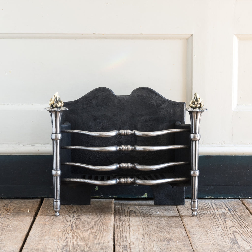 Early twentieth century English iron and brass firebasket,
