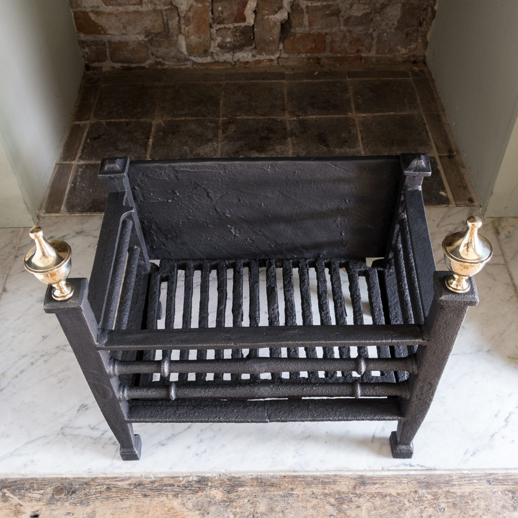 Late nineteenth century iron and brass fire basket,