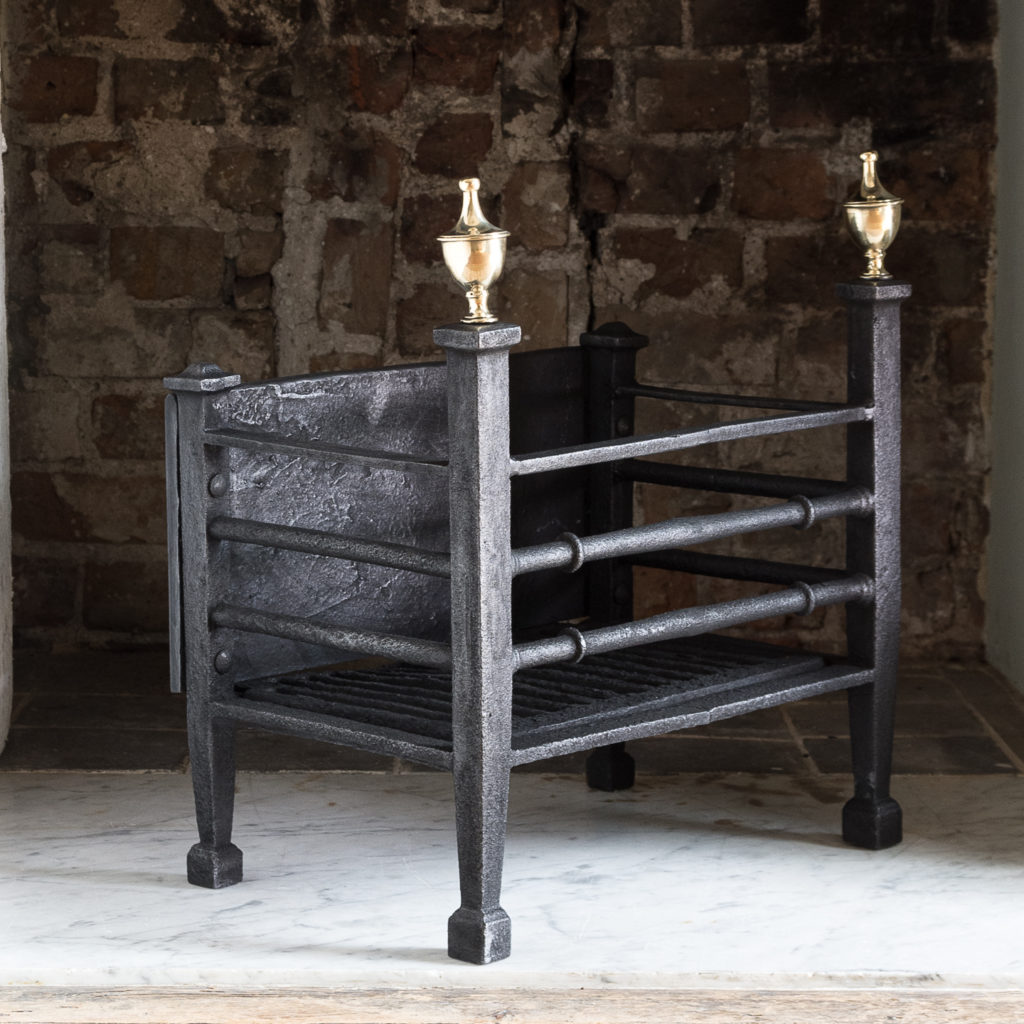 Late nineteenth century iron and brass fire basket,