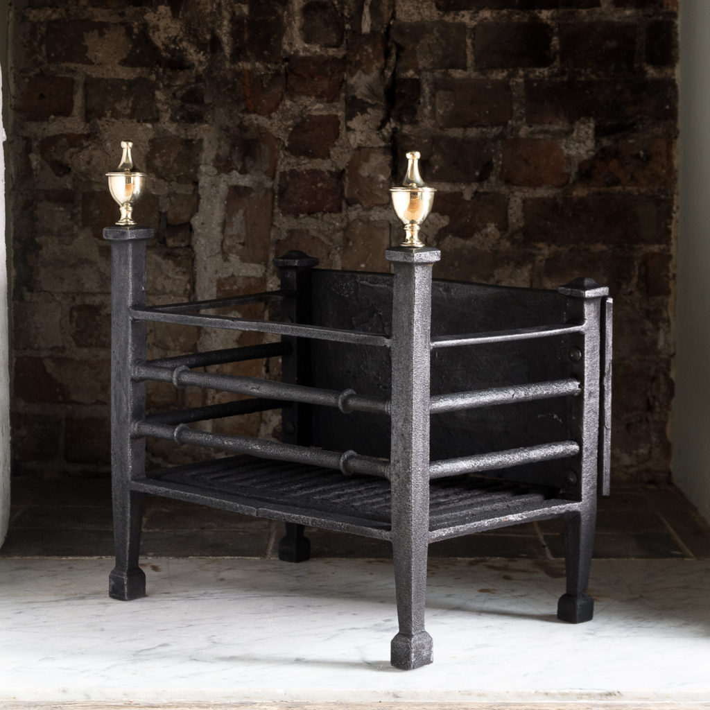 Late nineteenth century iron and brass fire basket,