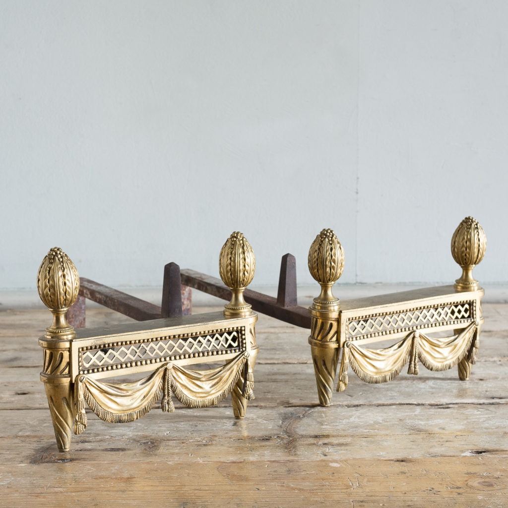 Pair of Louis XVI style Bouhon Freres gilt bronze chenets,