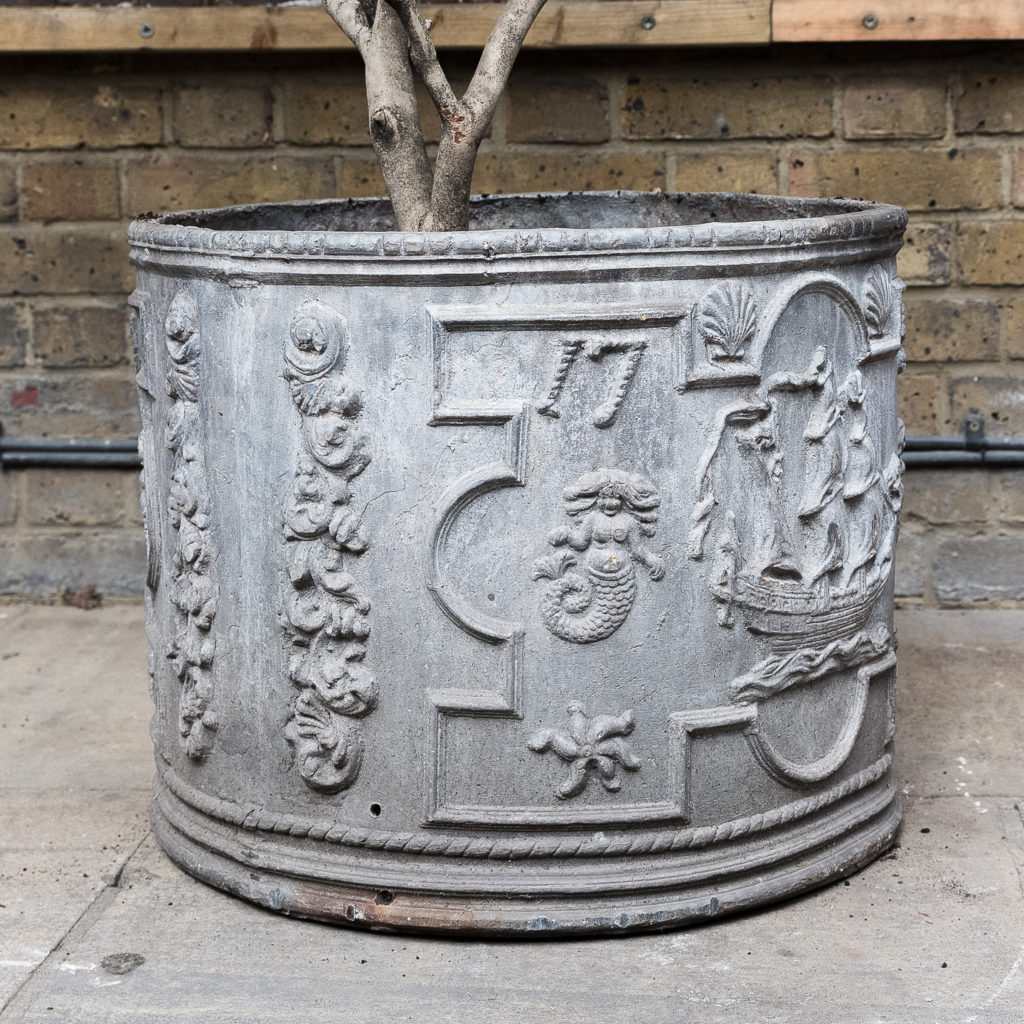 Pair of eighteenth century style lead circular planters,