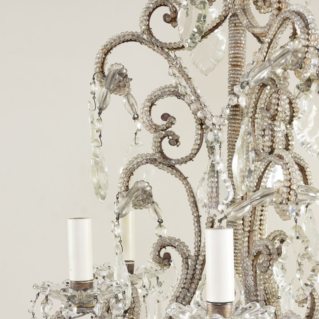 the c-scroll frames with all over beaded glass decoration,