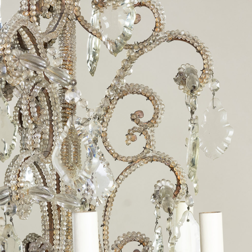 the c-scroll frames with all over beaded glass decoration,