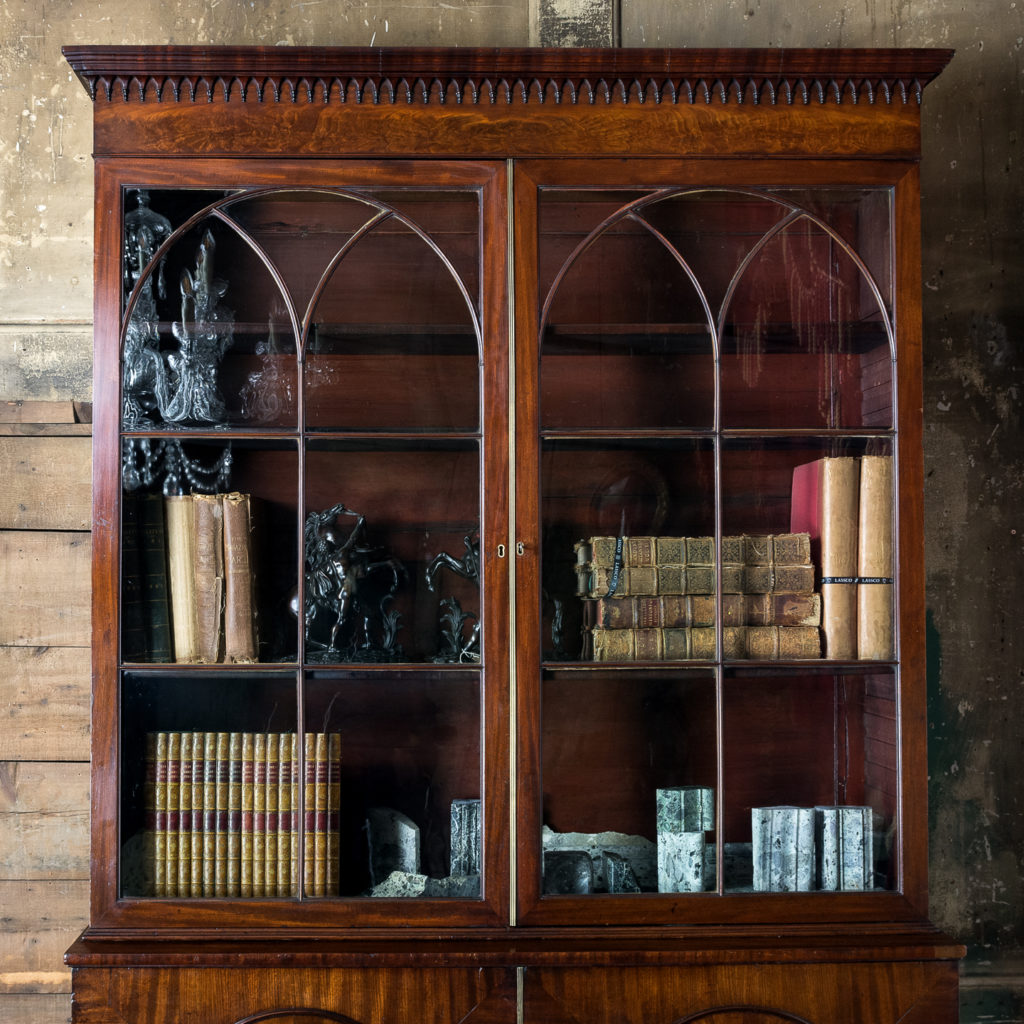 gothic glazed doors with astragal bars moulded as cluster columns,