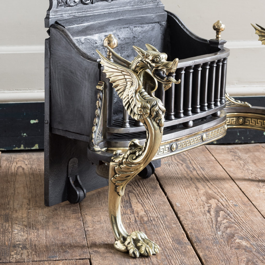 cast brass Griffin monopodia with hairy paw feet.