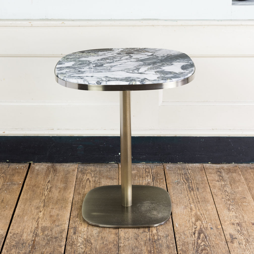 Brushed steel and marble restaurant tables,