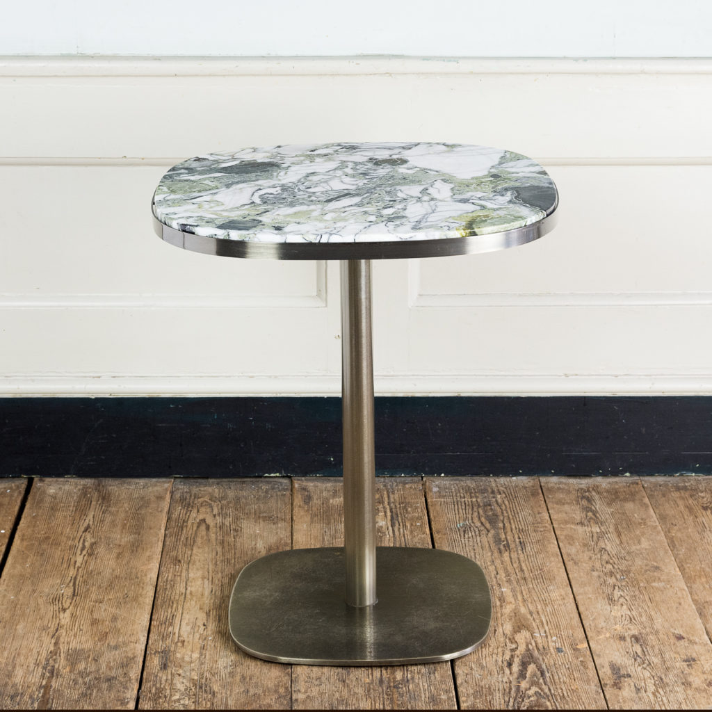 Brushed steel and marble restaurant tables,