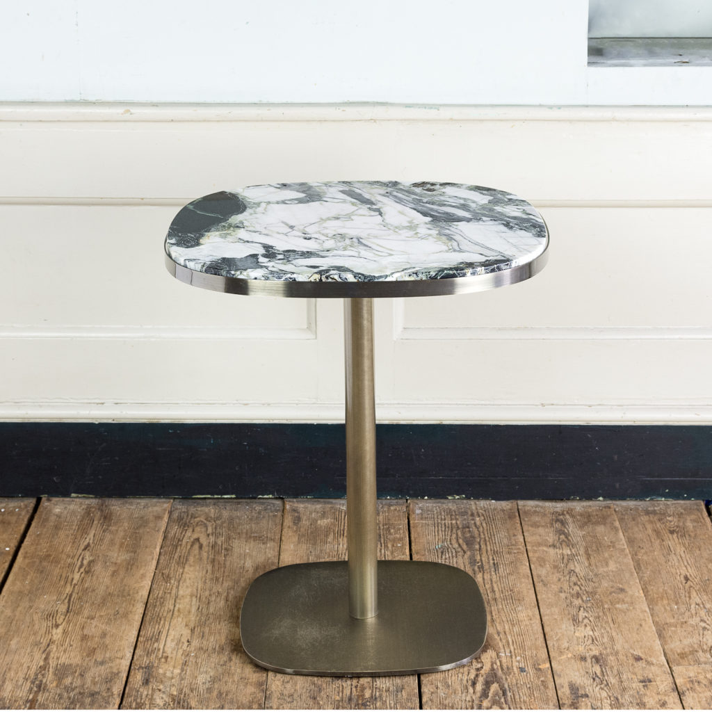 Brushed steel and marble restaurant tables,