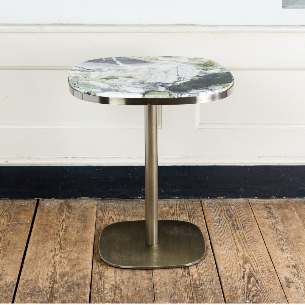Brushed steel and marble restaurant tables,