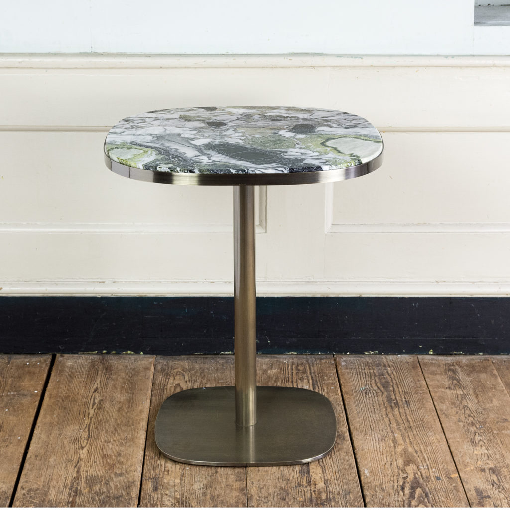 Brushed steel and marble restaurant tables,